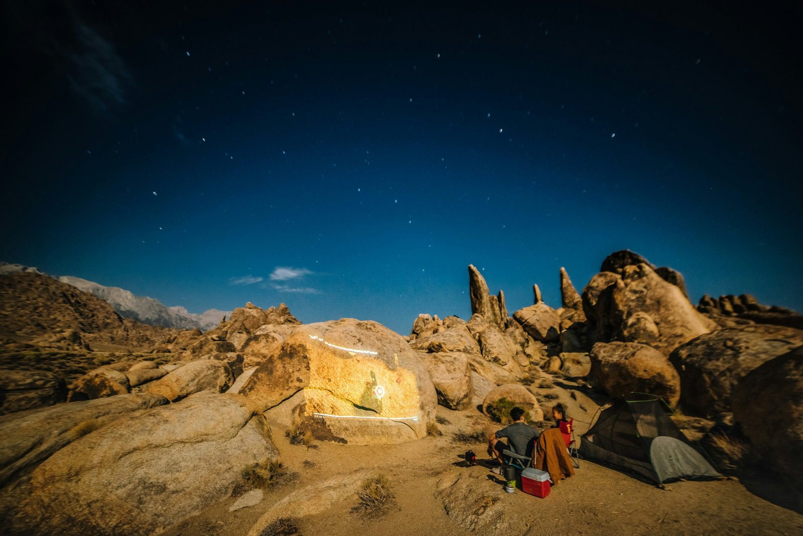 man and woman camping